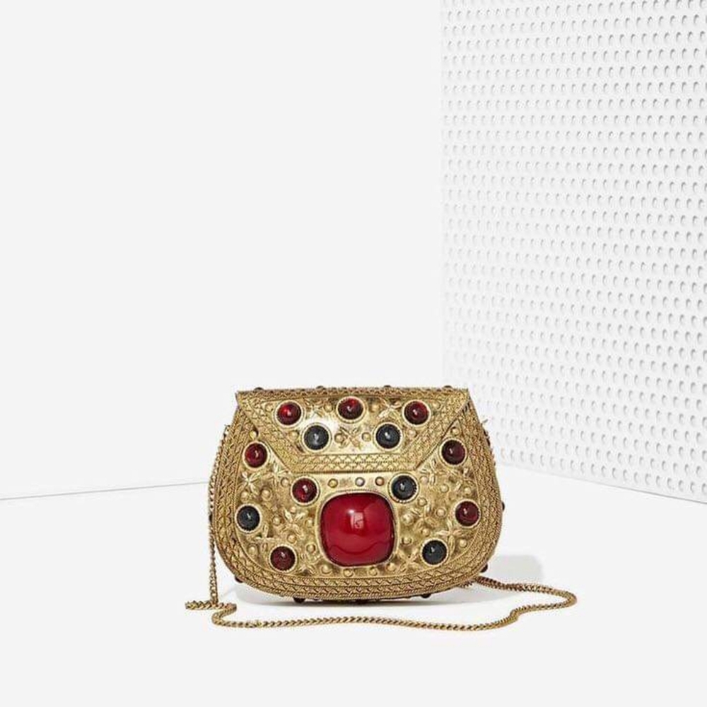 From St. Xavier Clutch, Red Ruby Stone & Gold Brass Metal